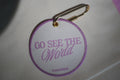 Pink go see the world tag